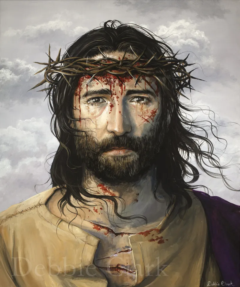 Crowned with Thorns: A portrait of Jesus Christ wearing a crown of thorns.
